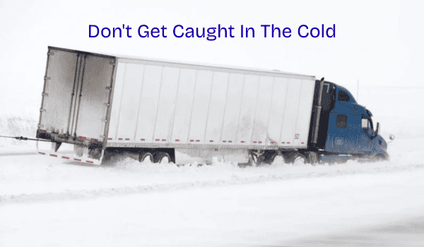 Winter Preventive Maintenance photo of Semi-Truck broken down on side on snow covered highway.